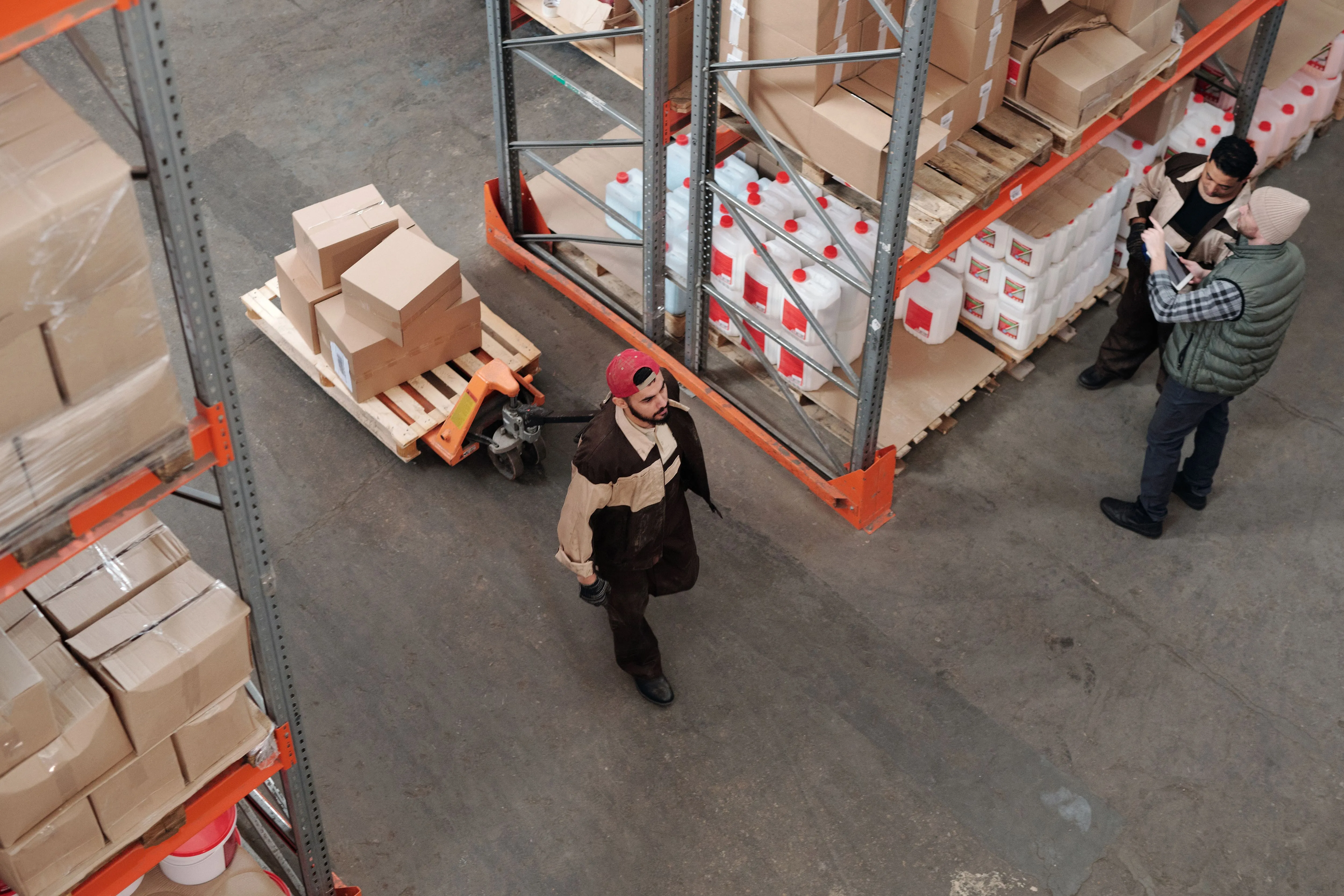 Industrial sourcing team coordinating warehouse operations